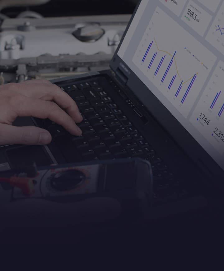 Hands on a laptop running license management system tests