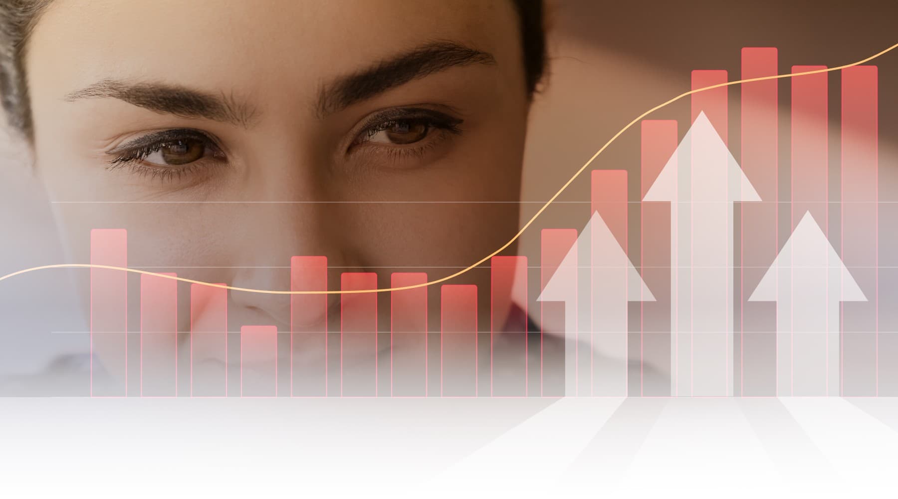 Close-up of a woman's eyes with rising charts for attention metrics