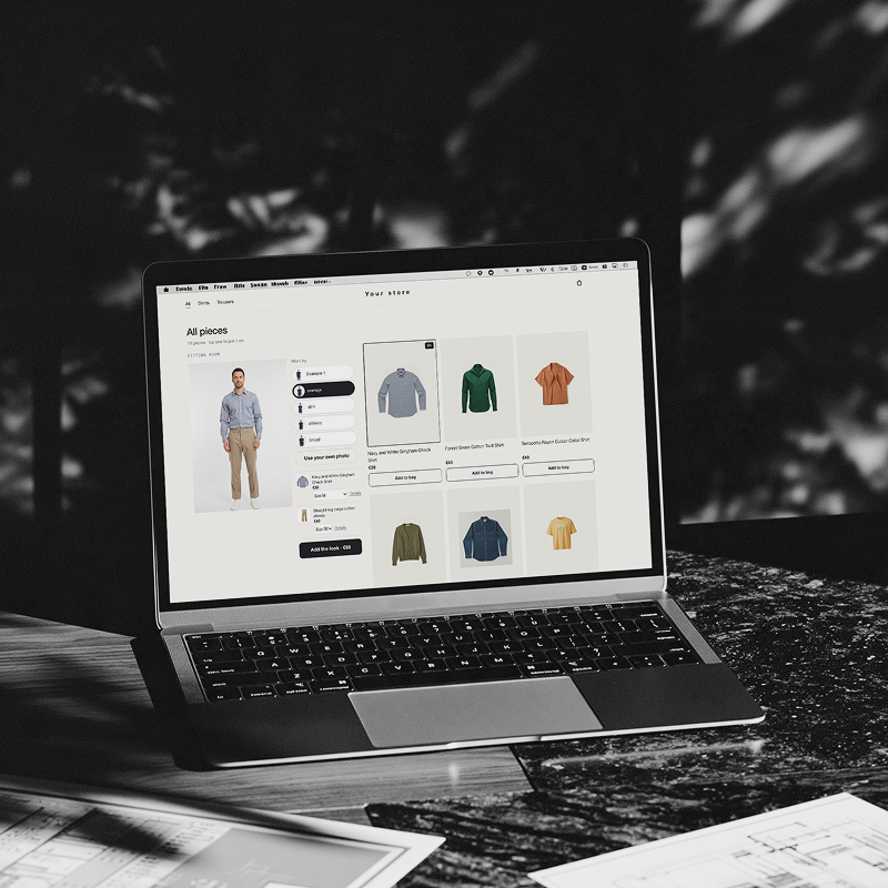 Online clothing store with virtual try-on on a laptop screen