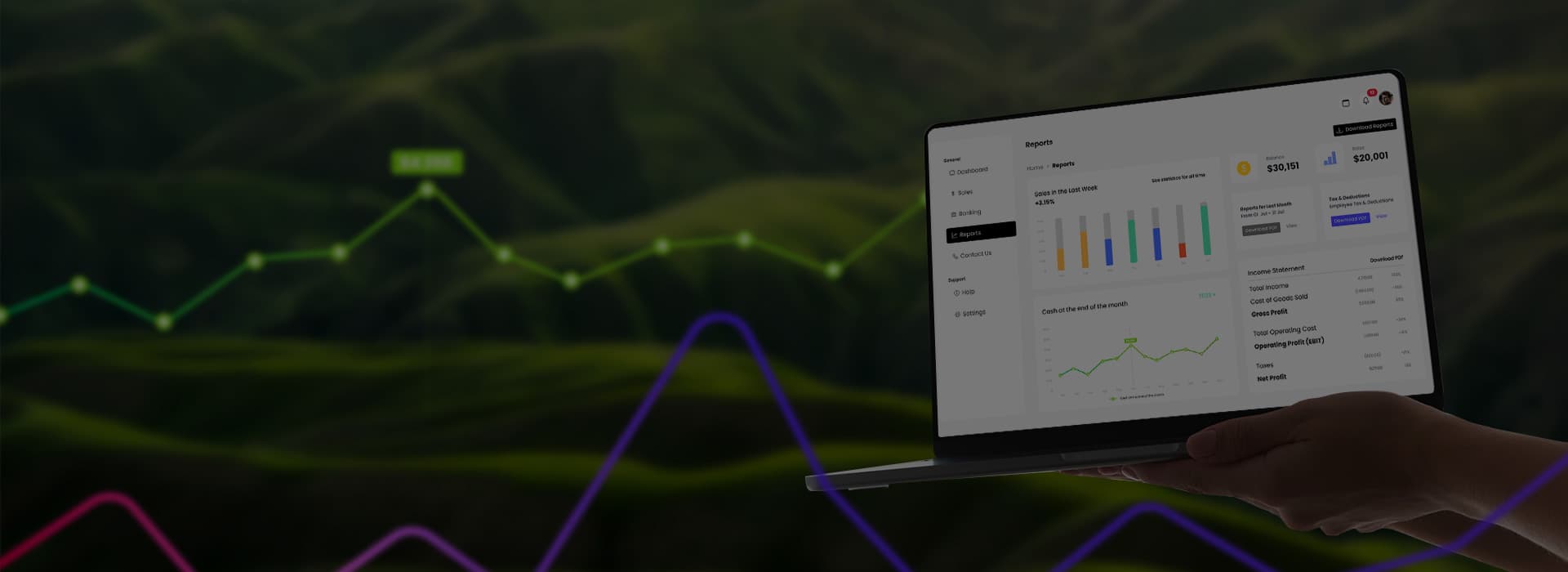 Laptop showing accounting software charts with a green trend line