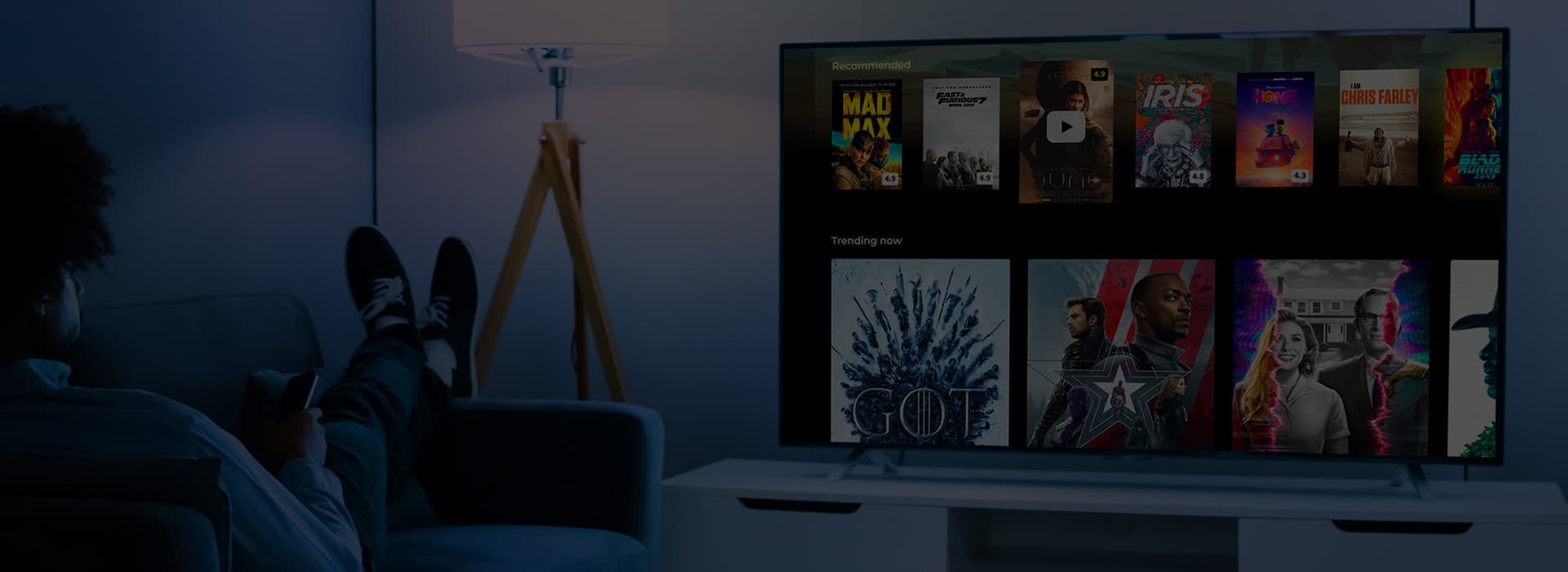 Living room TV showing an OTT platform catalog