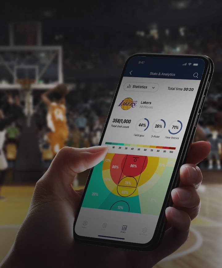 Phone showing live basketball action stats